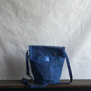 FRINGE SLING BAG